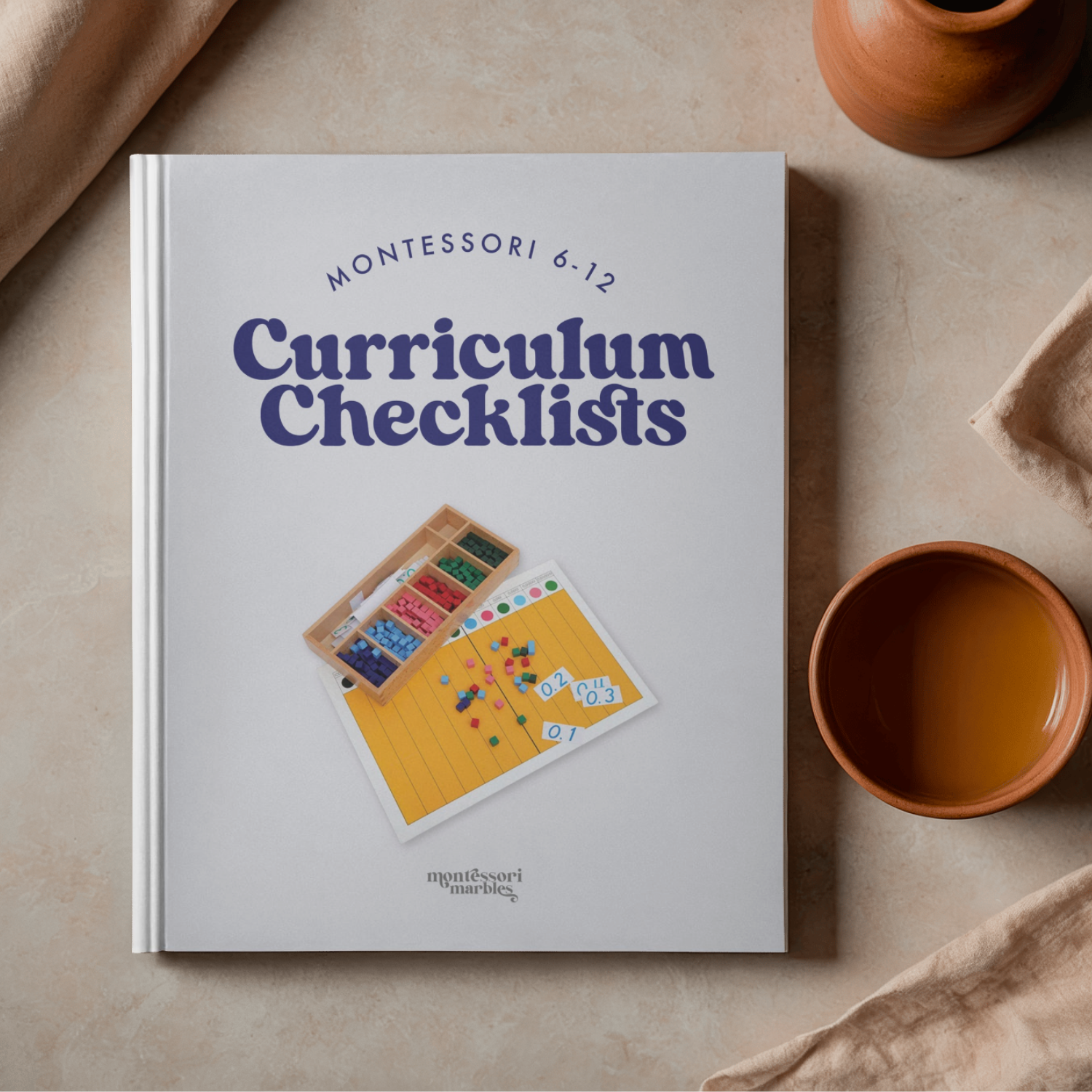 Montessori 6 to 12 Curriculum Checklists printable shown on a styled desk